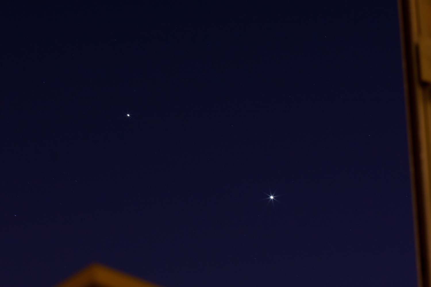 Jupiter and Venus Seen Through a Window