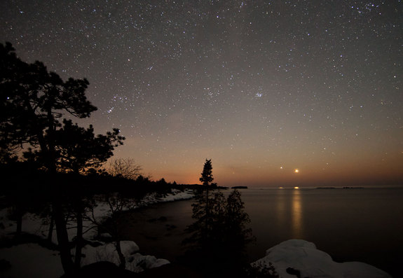 Skywatcher Shawn Malone captured this view of Venus and Jupiter from near Eagle Harbor, Mich. In the image, the bright planets are setting over Lake Superior.