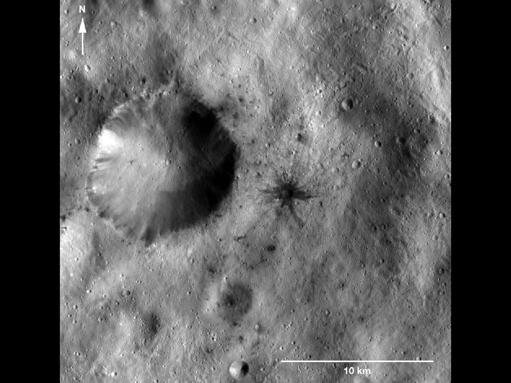 Dark-Rayed Crater and Spots
