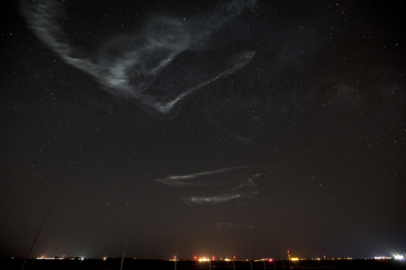 The chemical release of five ATREX sounding rockets created a series of glowing clouds in the high-altitude jet stream at the edge of space on March 27, 2012. Here is NASA's view from the Wallops Flight Facility at Wallops Island, Va.