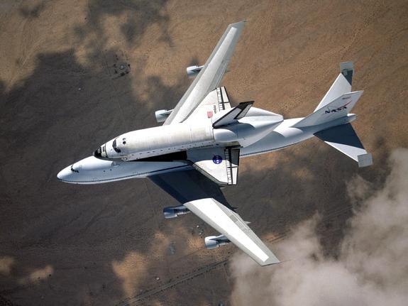 NASA space shuttle Columbia hitched a ride on a special 747 carrier aircraft for the flight from Palmdale, California, to Kennedy Space Center, Florida, on March 1, 2001.