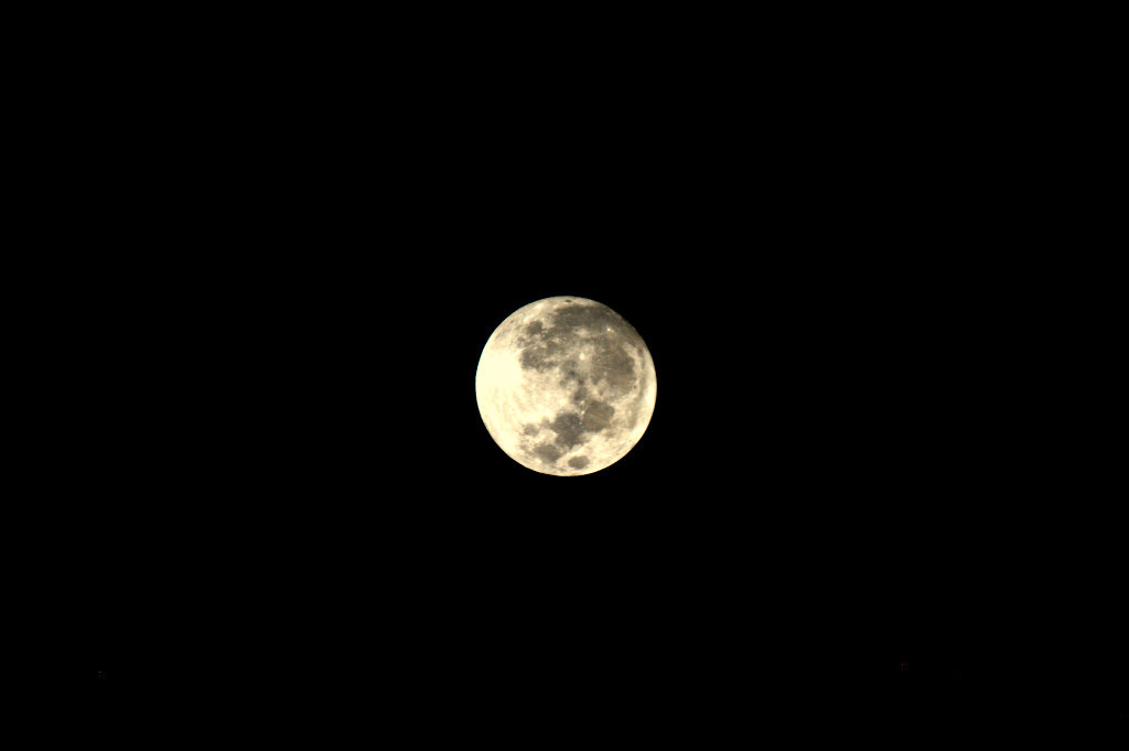 Supermoon Glowing in Night Sky