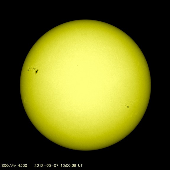 The monster sunspot AR1476 (top left) turns into view in this image from NASA's Solar Dynamics Observatory released on May 7, 2012.