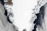 Satellite photo showing the southern portion of the Greenland ice sheet. The red dot marks Kangerlussuaq, the base of operations for the researchers.