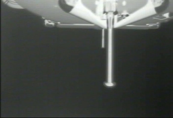 This view from SpaceX's Dragon capsule shows the opening of the guidance, navigation and control bay door.