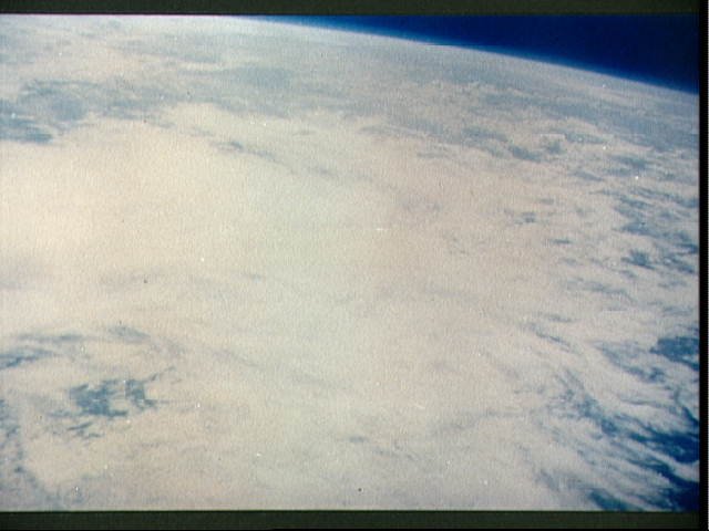 Earth and Sky Views Taken with Hand-held Camera During Mercury-Atlas 7