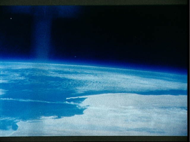 Earth and Sky Views Taken with Hand-held Camera During Mercury-Atlas 7