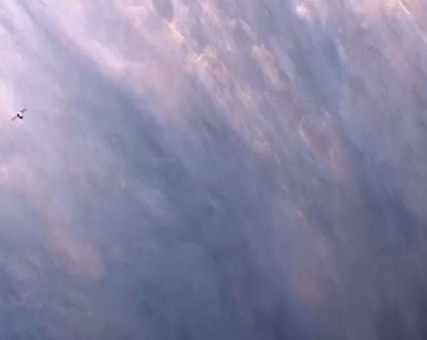 SpaceX Dragon at ISS: Colorful Clouds