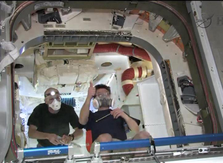 Astronauts Inside SpaceX's Dragon Capsule