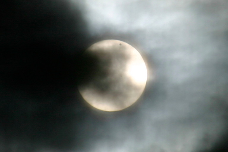 Venus Transit Through a Brooklyn Window Screen