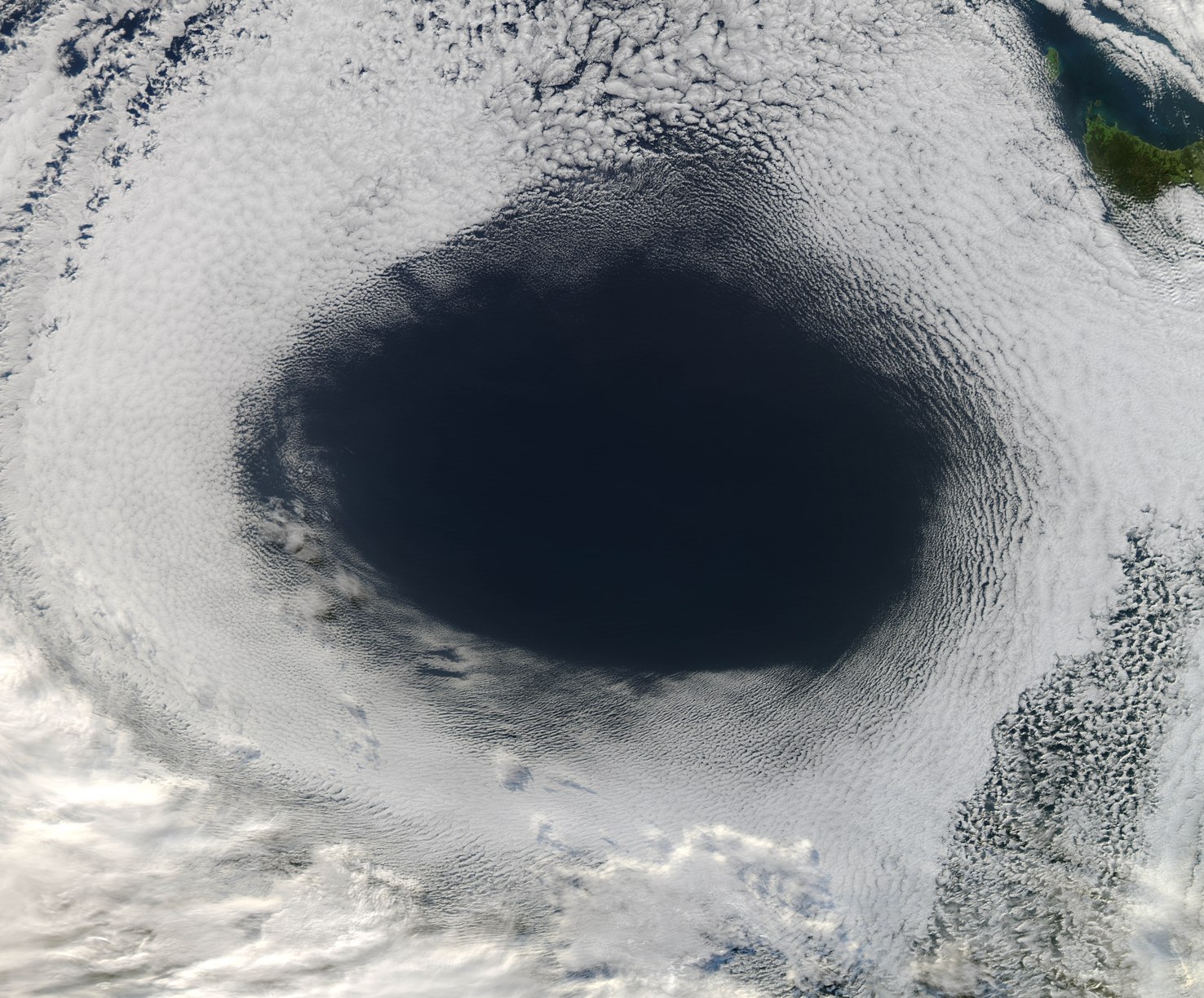 Huge Cloud Hole Photographed by Satellite