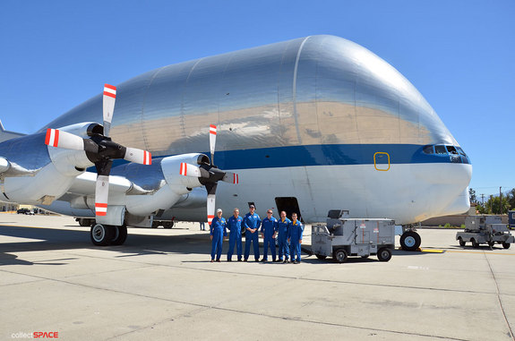 The Super Guppy flies with a crew of six: pilots Greg Johnson and Dick Clark, flight engineers David Elliott and Michael Robinson, aircraft mechanic Bob Coyne, electrician Dan Thompson and loadmaster Jon Myrick.