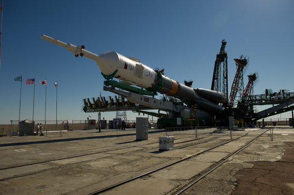 The Soyuz TMA-05M spacecraft is raised into position at the launch pad at the Baikonur Cosmodrome in Kazakhstan, Thursday, July 12, 2012.