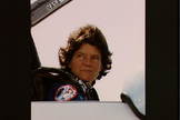 Astronaut Sally Ride is seated in the cockpit of a T-38 aircraft in preparation to depart for the Kennedy Space Center ahead of the STS-41G mission.