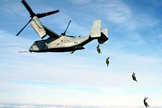 Paratroopers deploy from a V-22 Osprey.