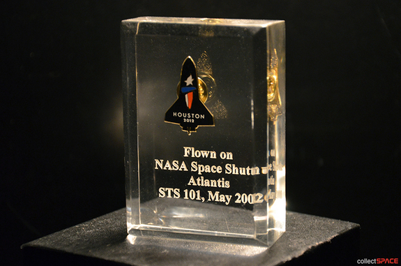 One of the 1,000 Houston 2012 Olympic lapel pins that launched aboard space shuttle Atlantis's STS-101 mission.