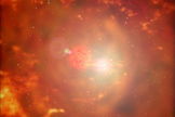 Material from a red giant star (right) falls onto a nearby white dwarf star, triggering nova explosions every few decades. Eventually, enough material will fall onto the white dwarf to trigger a supernova that destroys it. Released Aug. 23, 2012.