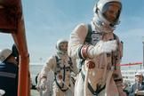 Commander Neil Armstrong (right) and pilot David R. Scott prepare to board the Gemini-Titan 8. Gemini VIII successfully launched at 11:41 a.m. EST, March 16, 1966. The mission conducted the first docking of two spacecraft in orbit and landed safely back on Earth after an emergency abort.
