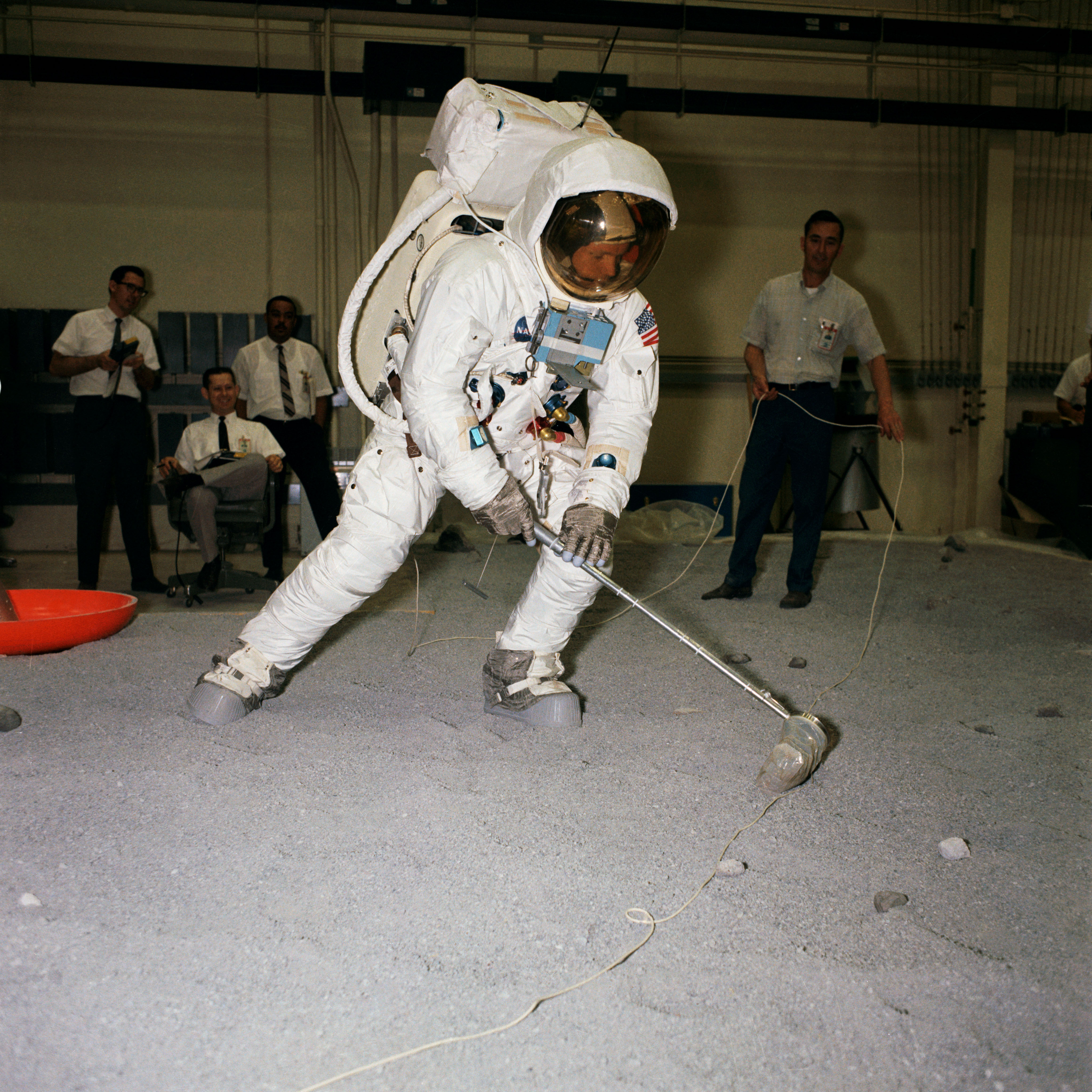 Neil Armstrong Tests Moon Rock Grabbing