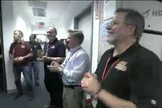 Mission controllers at NASA's Jet Propulsion Laboratory in Pasadena, CA, listen and clap along to will.i.am's new song that was beamed from Mars back to Earth, August 28, 2012.