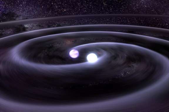 This illustration shows the gravitational waves thought to be produced by two orbiting white dwarf stars in a binary system called J0651, according to an August 2012 study.