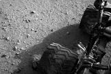 Martian dirt clings to the wheels of NASA's Curiosity rover in this photo taken Aug. 28, 2012, after the rover's first long drive, a 52-foot trek.