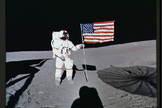 Alan Shepard plants the U.S. flag during Apollo 14's lunar mission.