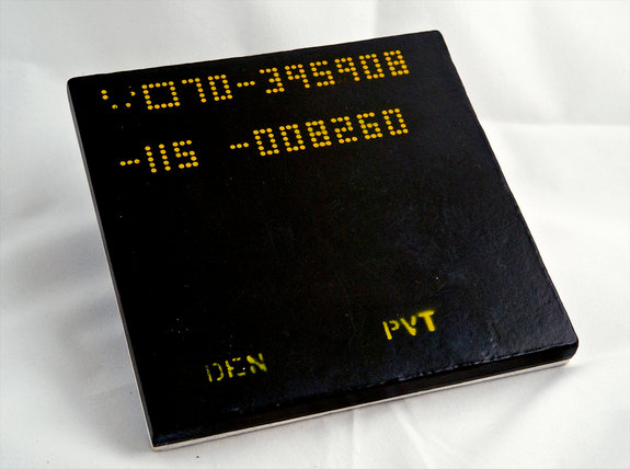 An example of one the more than 20,000 heat shield tiles used to protect the space shuttle while entering the atmosphere.