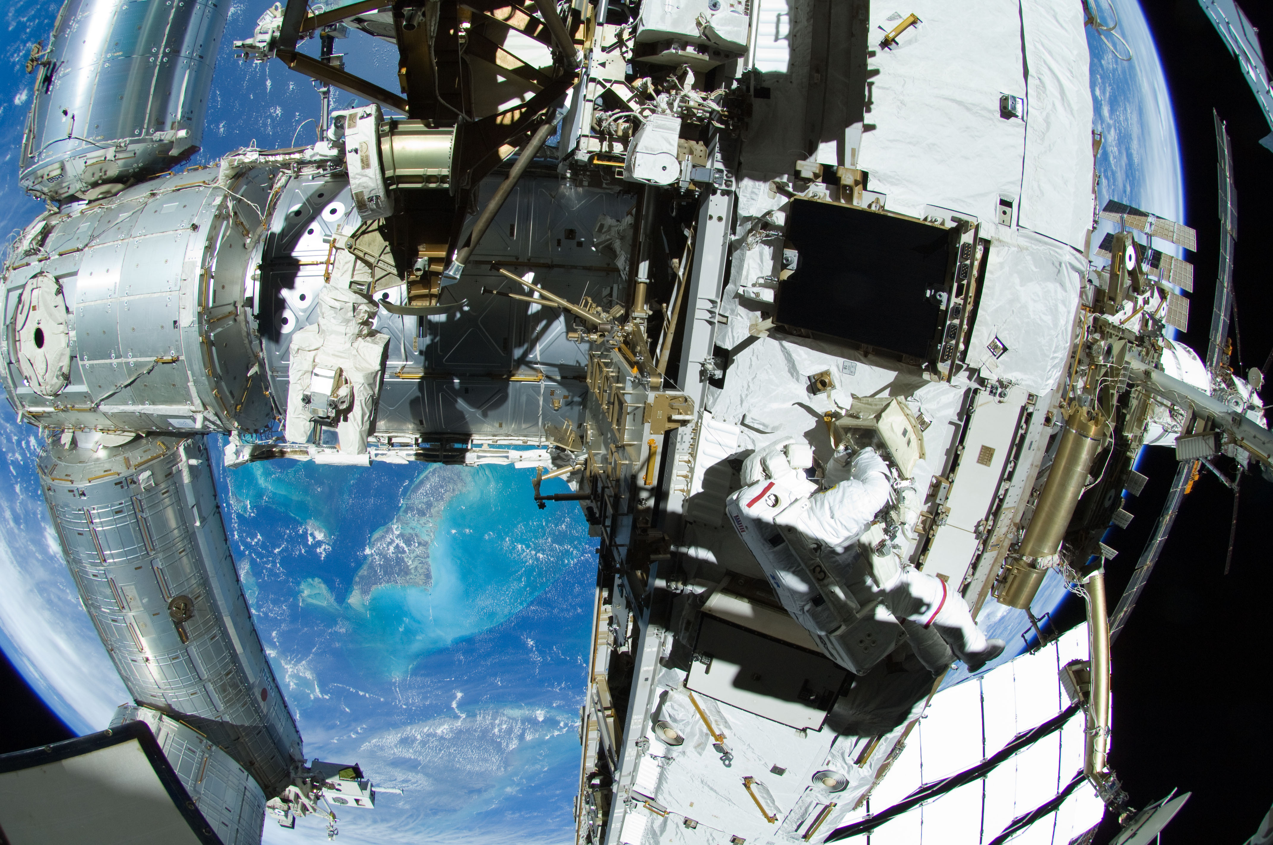 Astronauts Outfitting ISS