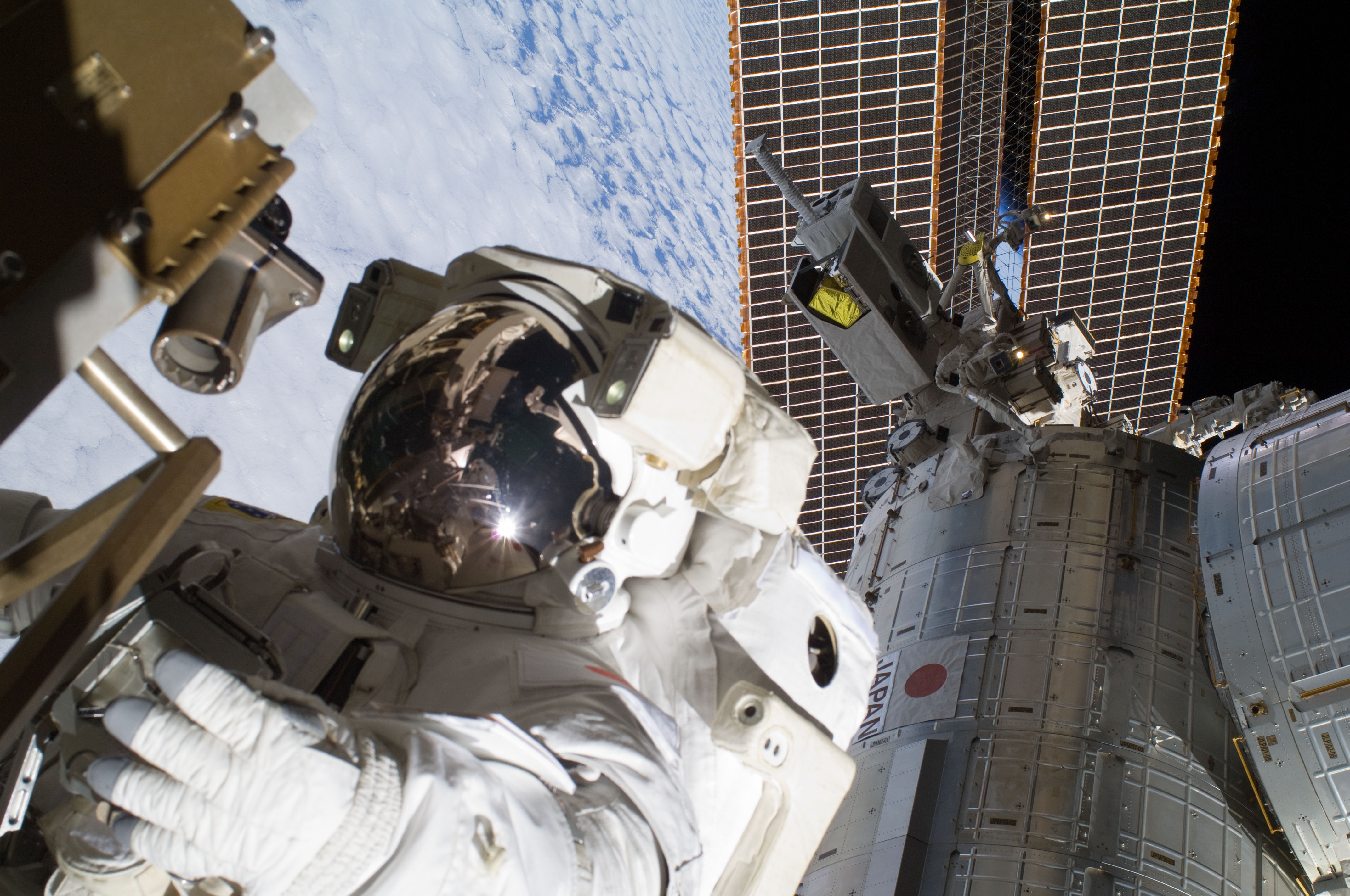 Spacewalkers Fix Space Station Power Unit (Photos)