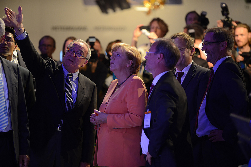 German Chancellor Angela Merkel Visits the Exhibition