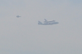 NASA's space shuttle Endeavour soars over Long Beach, Calif., on the way to a Los Angeles landing on Sept. 21, 2012 in this view by shuttle spotter Holly Holbrook. Endeavour landed in Los Angeles to end a 4.5-hour aerial tour of California. The shuttle will be placed on display at the California Science Center in L.A.