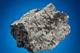 This Mars meteorite, which weighs 0.75 pounds (327 grams), landed in July 2011 as part of a shower in the vicinity of Tissint, Morocco, the location that gives the meteorite its name.