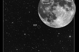 This image compares the angular size of the Hubble Extreme Deep Field survey to the angular size of the full Moon. The XDF is a very small fraction of sky area, but provides a "core sample" of the heavens over 13 billion light-years. Image released Sept. 25, 2012.