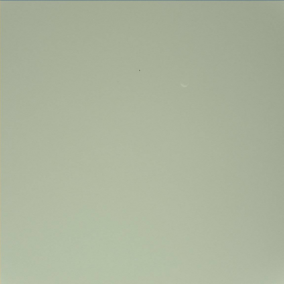 NASA's Mars rover Curiosity snapped this photo of the largest Martian moon Phobos during a Mars sky observing session. Phobos is Mars' largest moon, but only 14 miles across. Image released Sept. 26, 2012.