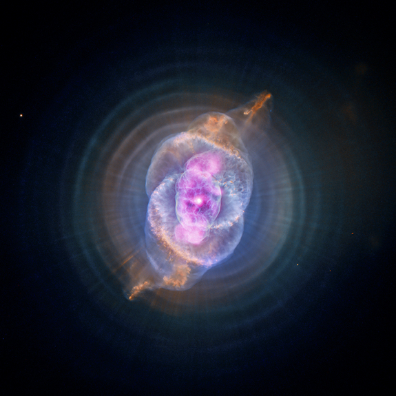 This image is NGC 6543 known as the Cat's Eye Nebula as it appears to the Chandra X-Ray Observatory and Hubble Telescope. A planetary nebula is a phase of stellar evolution that the sun should experience several billion years from now, when it expands to become a red giant and then sheds most of its outer layers, leaving behind a hot core that contracts to form a dense white dwarf star. This image was released Oct. 10, 2012.