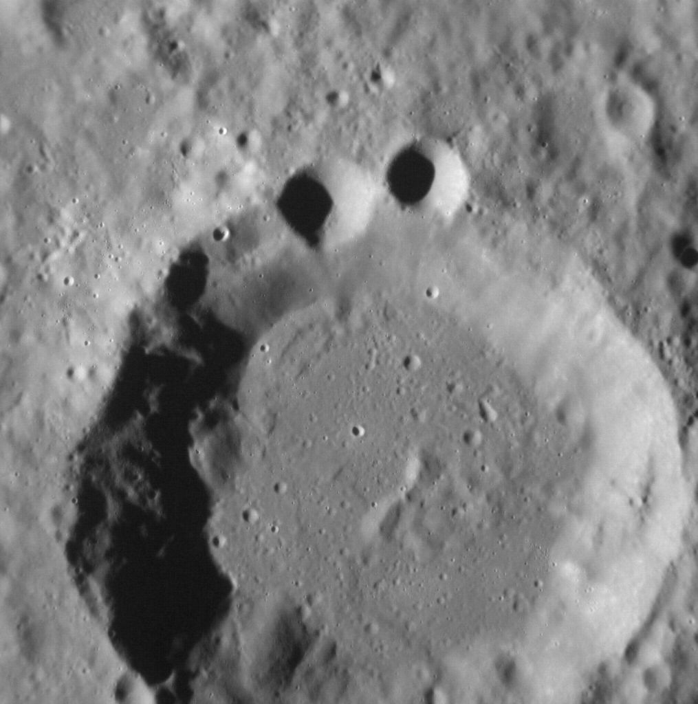 Mercury Craters Look Like Cookie Monster in NASA Photo