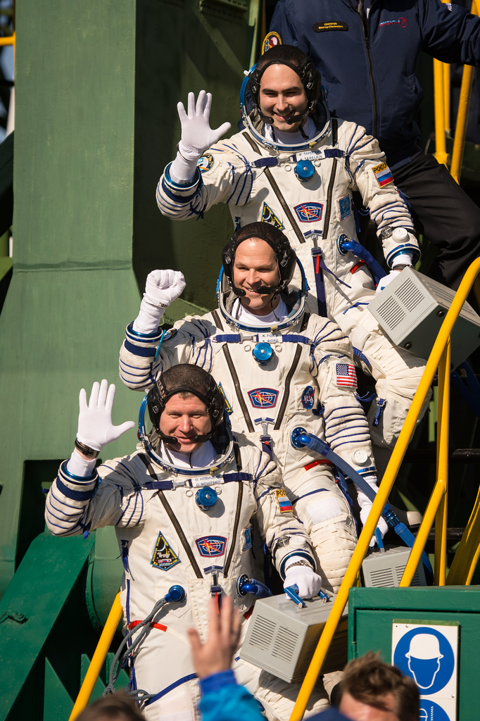 Expedition 33/34 Soyuz Crew Waves at Launch Pad