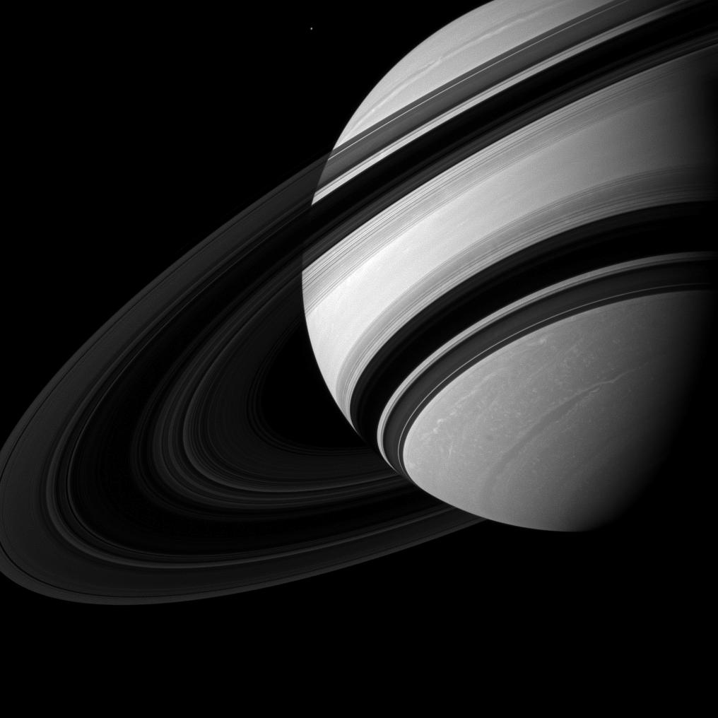Amazing Photo Shows Saturn Dwarfing Tiny Moon