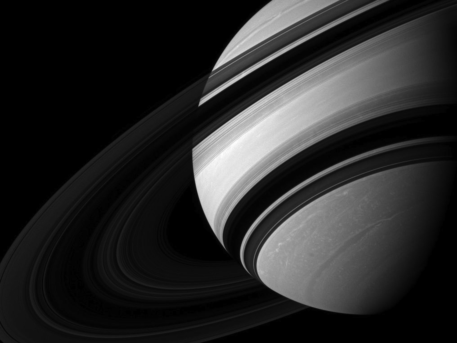Dwarfed by Saturn