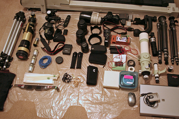 Before packing their gear for the July 11, 2010 solar eclipse, Imelda Joson and Edwin Aguirre like to lay out all their telescopes, lenses, cameras, tripods, laptop computer, and accessories on the floor.