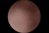 An early artist's interpretation of the dwarf planet Makemake beyond Pluto.