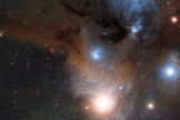 This wide-field view shows the star-forming region Rho Ophiuchi in the constellation of Ophiuchus (The Serpent Bearer), as seen in visible light. This view was created from images forming part of the Digitized Sky Survey 2.