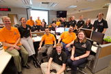 Mission accomplished! The GRAIL team at Lockheed Martin near Denver pose in their Mission Support Area after the Ebb and Flow spacecraft were sent crashing into the moon.