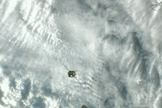 The Soyuz TMA-07M spacecraft approaches the International Space Station for docking Dec. 21, carrying three new crewmembers for the Expedition 34 mission.