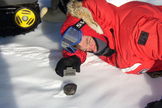 NASA astronaut Stan Love poses with a meteorite found in Antarctica during a 2004-2005 expedition by the Antarctic Search for Meteorites Program at Case Western Reserve University. He ventured back to Antarctica in December 2012 to seek out more space rocks.