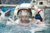 NASA astronaut Chris Cassidy, Expedition 35/36 flight engineer, attired in a training version of his Extravehicular Mobility Unit (EMU) spacesuit, is submerged in the waters of the Neutral Buoyancy Laboratory (NBL) near NASA's Johnson Space Center.