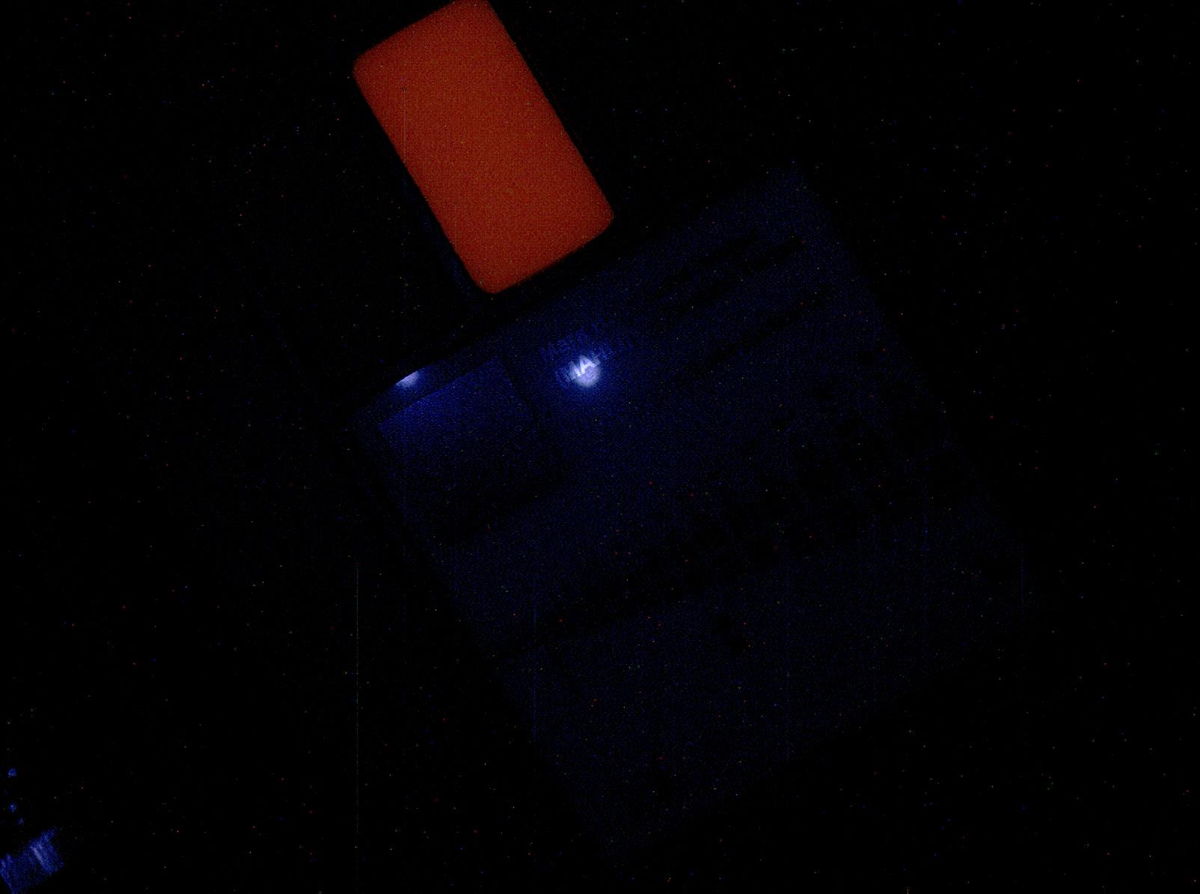 First Night Image of MAHLI Calibration Target Under Ultraviolet Lights