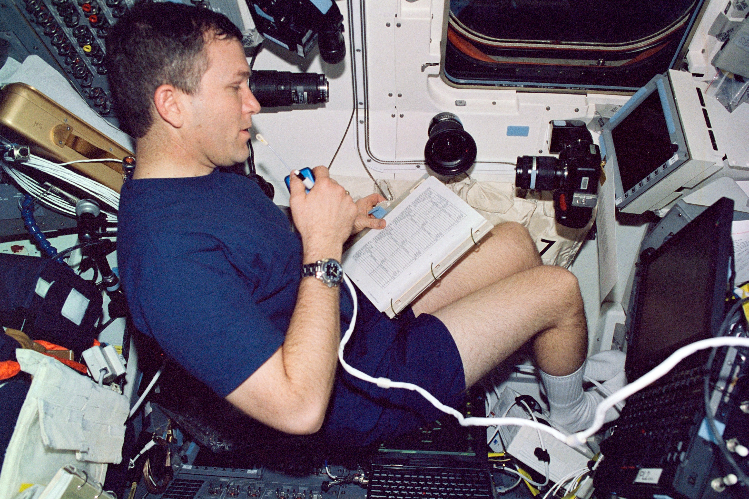Astronaut Rick Husband on Aft Flight Deck