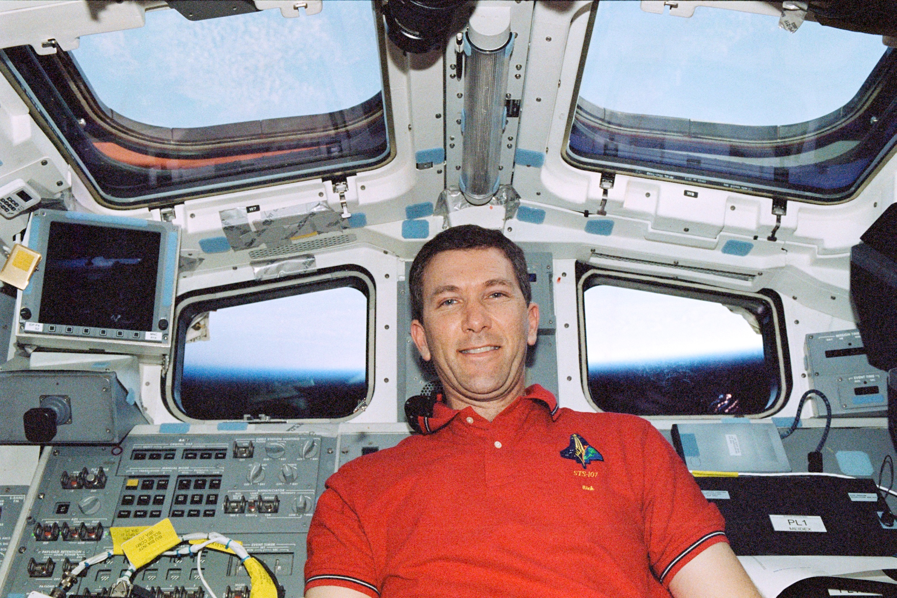 Astronaut Rick Husband Near Control Panels